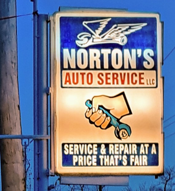 Norton's Auto Service sign